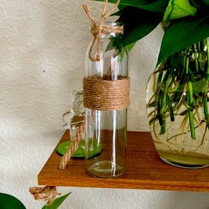 Glass vase with crystal bracelet and plant trimmings